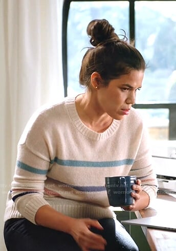 Amy's white multi-stripe sweater on Superstore