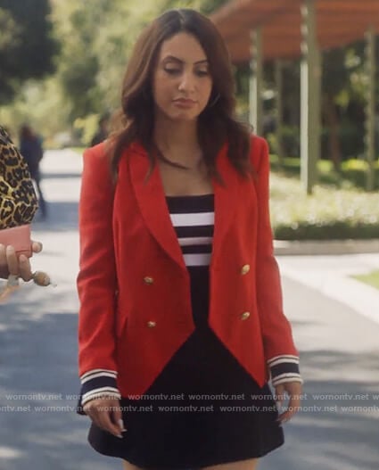 Ana's red cutaway blazer with cuffs on Grown-ish