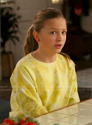 Anna's yellow tie dye sweatshirt on American Housewife