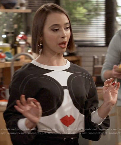 Celia's face with sunglasses sweatshirt on Call Your Mother