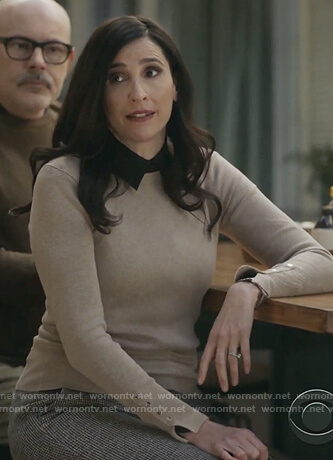 Delia's beige button cuff sweater on The Unicorn