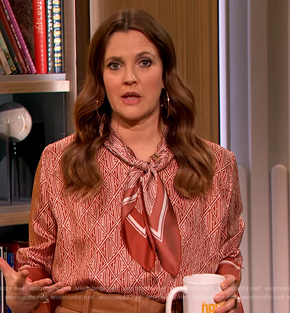 Drew's red printed tie neck blouse on The Drew Barrymore Show