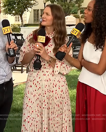 Drew's floral print blouse and pleated skirt on The Drew Barrymore Show