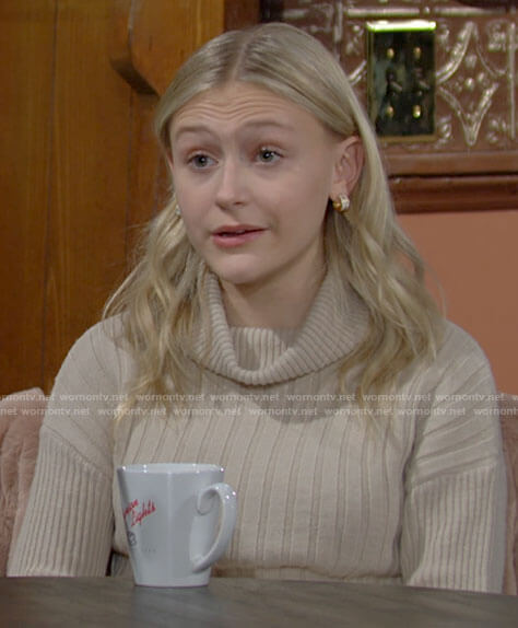 Faith's beige turtleneck sweater on The Young and the Restless