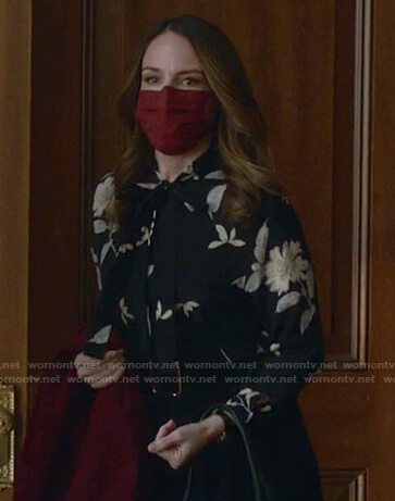 Izzy's black floral tie neck blouse on Bull