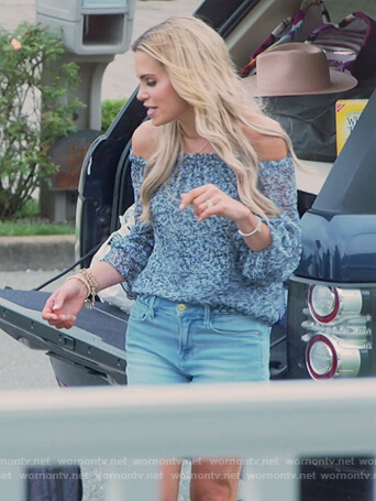 Jackie's blue floral off shoulder top on The Real Housewives of New Jersey