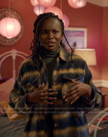 Jennifer's blue and yellow oversized shirt on Black Lightning