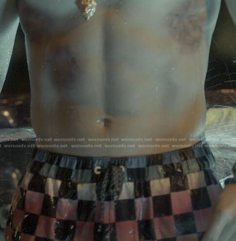 JJ's rainbow checkerboard board shorts on Outer Banks