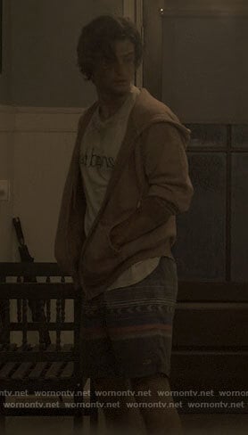 John B's pink hoodie and printed board shorts on Outer Banks