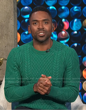 Justin's green cable knit sweater on E! News Daily Pop