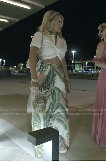 Kary's white cropped top and pineapple print pants on The Real Housewives of Dallas