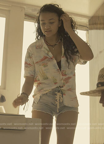 Kiara's printed button up shirt and denim shorts on Outer Banks
