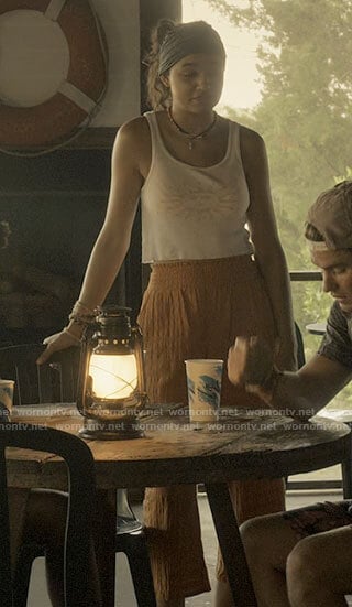 Kiara's sun top and orange pants on Outer Banks