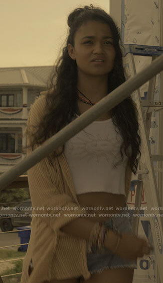 Kiara's yellow striped shirt, sun top and denim lace-up shorts on Outer Banks