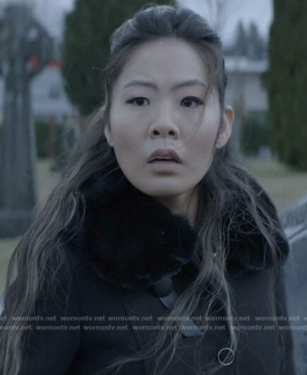 Mary's black fur collar coat and patent leather boots on Batwoman