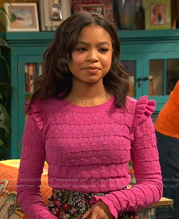 Nia's pink ruffle knit sweater on Ravens Home