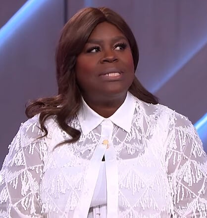 Retta's white fringe trim blouse and pants on The Kelly Clarkson Show