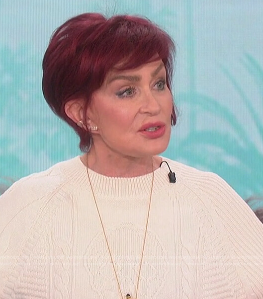 Sharon's white skull knit sweater on The Talk
