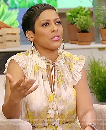 Tamron's yellow floral ruffled dress on Tamron Hall Show