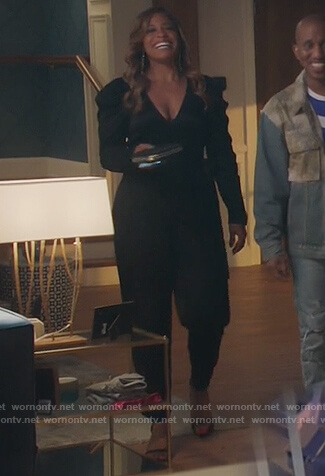 Mika's black puff sleeve jumpsuit on Kenan