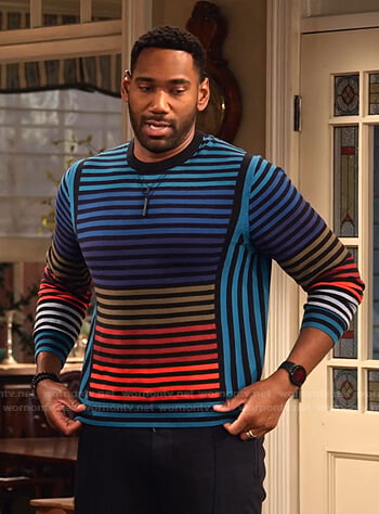 Moz's striped sweater on Family Reunion