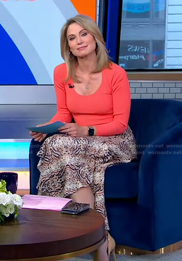 Amy's orange scoop neck top and animal print skit on Good Morning America