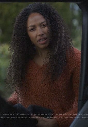 Cassie's rust brown textured sweater on Big Sky