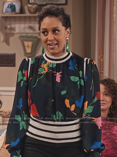 Cocoa's blue floral print rib trim blouse on Family Reunion