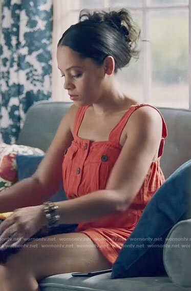 Darla's red linen button front romper on Queen Sugar