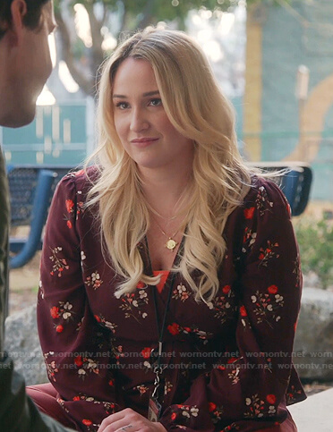 Davia's burgundy floral wrap top on Good Trouble