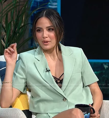Erin's green short sleeve jacket and shorts on E! News Daily Pop