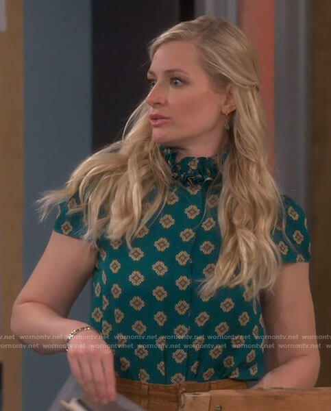 Gemma's green printed ruffle neck top on The Neighborhood