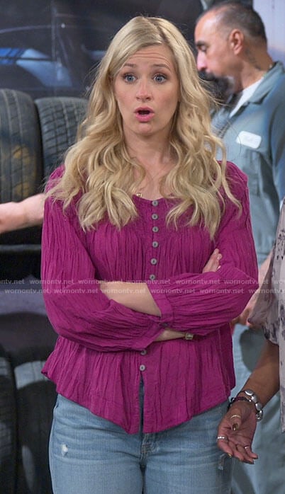 Gemma's pink crinkled button down top on The Neighborhood