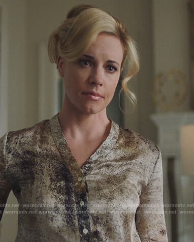 Kelly Anne's printed satin blouse on Queen of the South