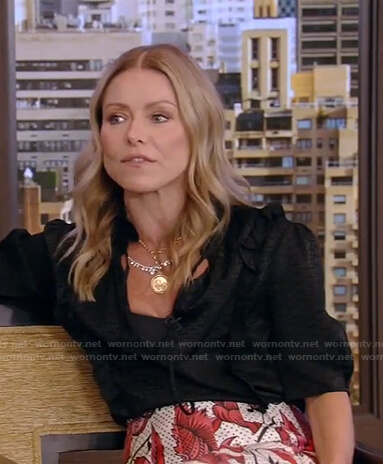 Kelly's black top and floral pleated skirt on Live with Kelly and Ryan