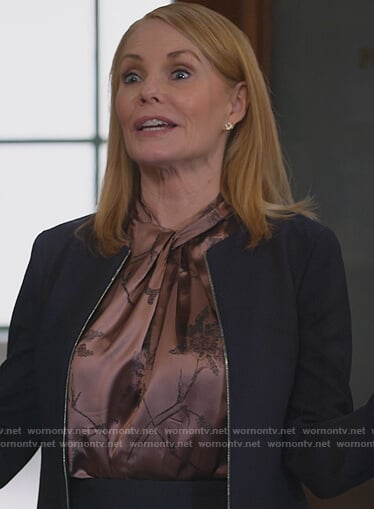 Lisa's brown floral twist neck top on All Rise