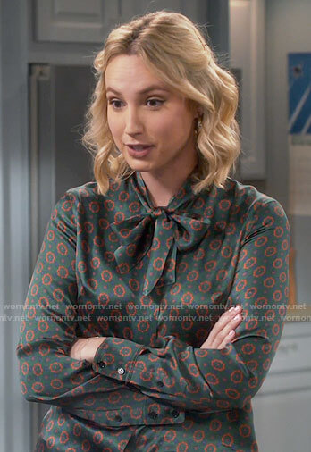 Mandy's green printed tie neck blouse on Last Man Standing