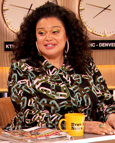 Michelle Buteau's chain link print jumpsuit on The Drew Barrymore Show