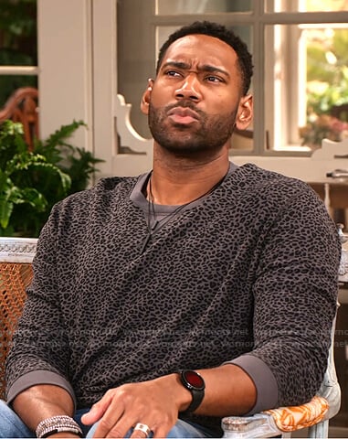 Moz's grey leopard print sweatshirt on Family Reunion