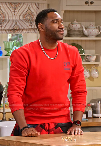 Moz's red logo print sweatshirt on Family Reunion