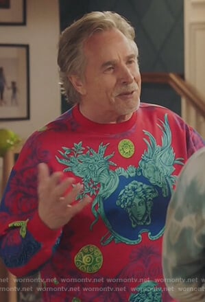 Rick's red printed sweater on Kenan