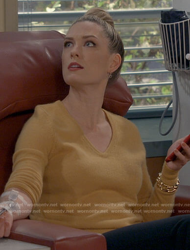Samantha's yellow v-neck sweater on B Positive