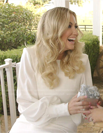 Stephanie's white long sleeve sheath dress on The Real Housewives of Dallas