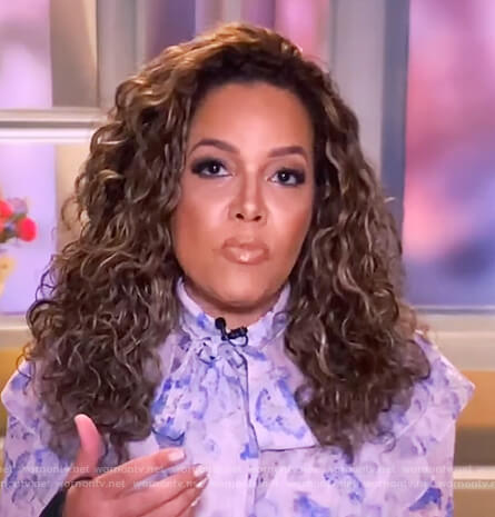 Sunny's blue floral tie neck blouse on The View