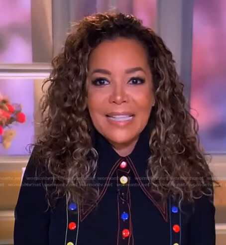 Sunny's black button-embellished shirt on The View
