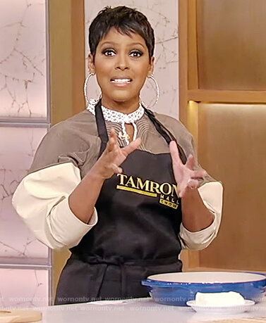 Tamron's green two-tone puff sleeve dress on Tamron Hall Show