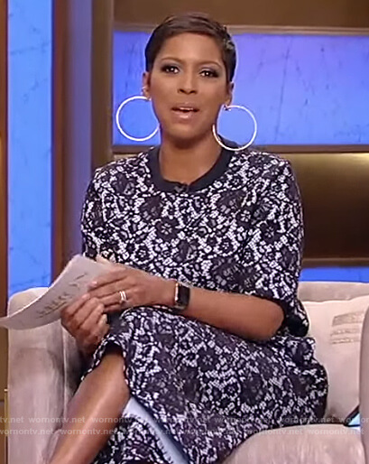 Tamron's blue floral lace top and pants on Tamron Hall Show