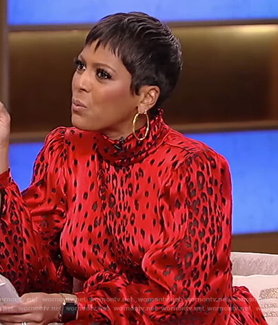 Tamron's red leopard satin dress on Tamron Hall Show