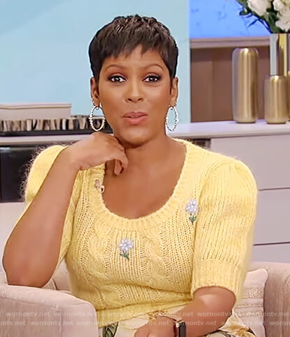 Tamron's yellow floral embroidered sweater on Tamron Hall Show