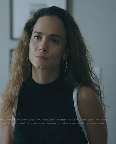 Teresa's black sleeveless top with contrast trim on Queen of the South